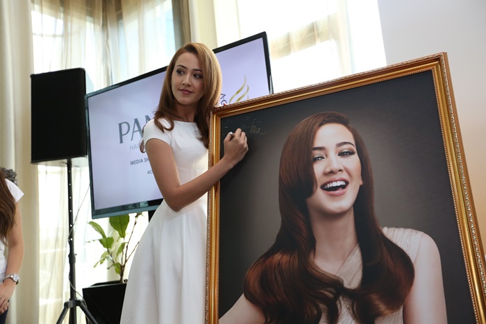 Girl autographed a framed portrait