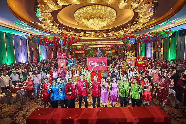 Celebrate Prosperity, Happiness, Wealth and Good Luck in Vibrant Red, Pink, Green and Blue with Carlsberg this CNY!		
