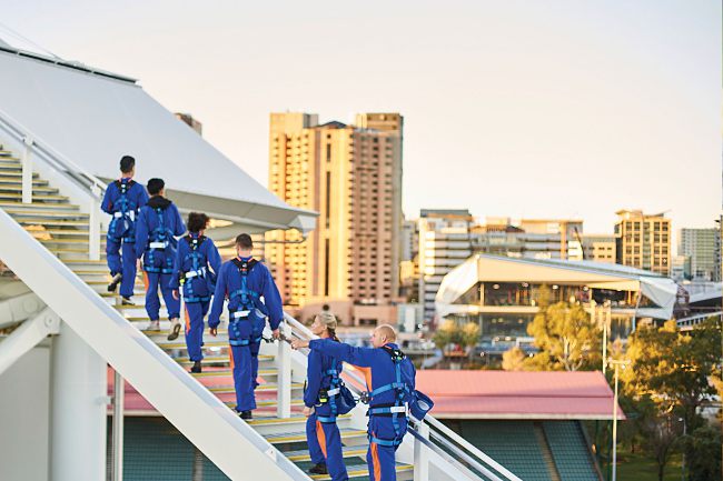 People Are Climbing This Stadium’s Roof In Australia To Get A Better View Of The Game!