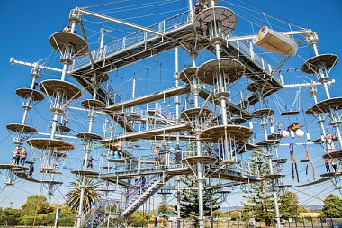THIS HUGE ADVENTURE PARK ALLOWS YOU TO SWING IT LIKE MILEY CYRUS’ WRECKING BALL & BIKE ON A NARROW PATH METRES ABOVE GROUND!