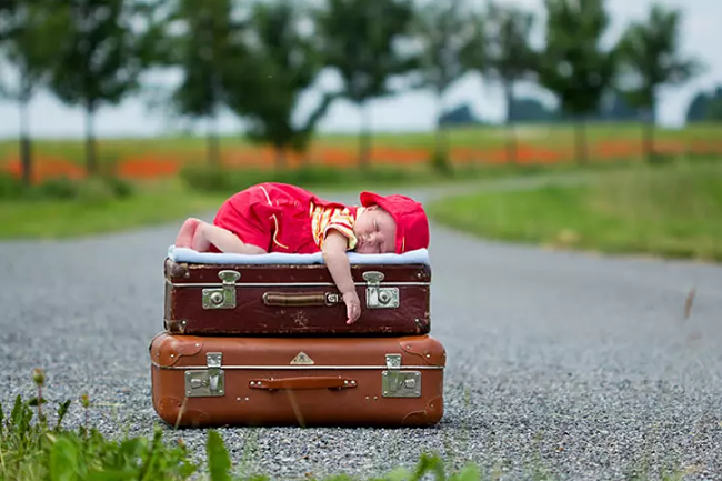 Baby and suitcase